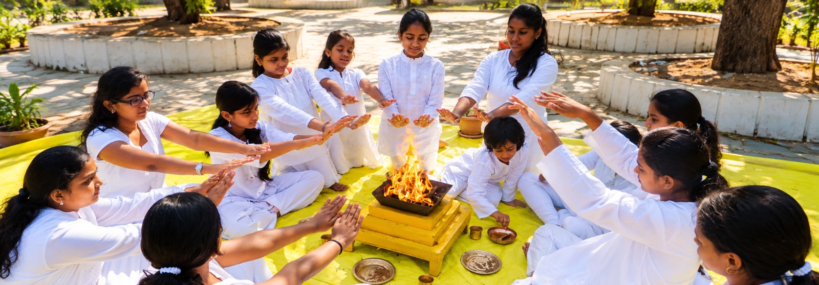 Children gathered for a Vedic havan at summer camp